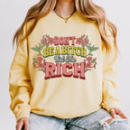 Don’t Be a Bitch, Eat the Rich graphic sweatshirt featuring Floral Anti-Capitalist