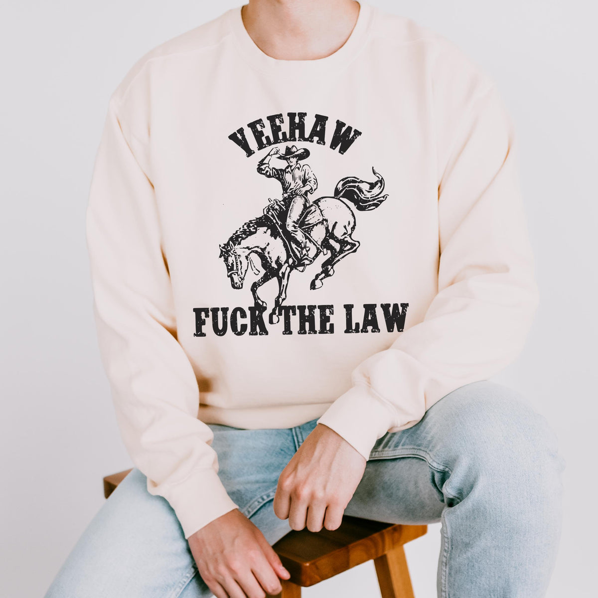 Yeehaw Fuck the Law graphic sweatshirt featuring Outlaw Cowboy Western