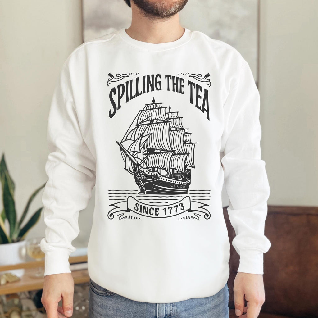 Spilling the Tea Since 1773 graphic sweatshirt featuring Boston Tea Party