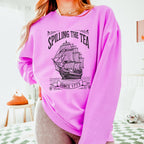 Spilling the Tea Since 1773 graphic sweatshirt featuring Boston Tea Party