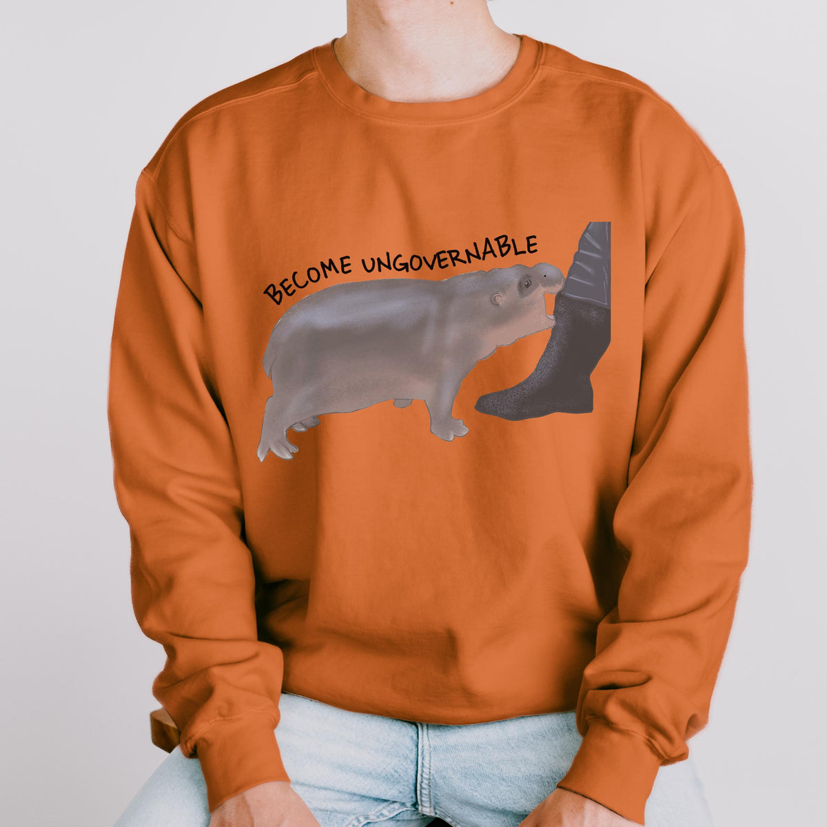Become Ungovernable graphic sweatshirt featuring Chaotic Baby Hippo
