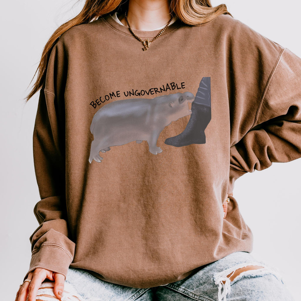 Become Ungovernable graphic sweatshirt featuring Chaotic Baby Hippo