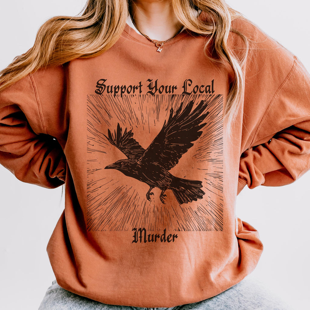 Support Your Local Murder graphic sweatshirt featuring Gothic Crow