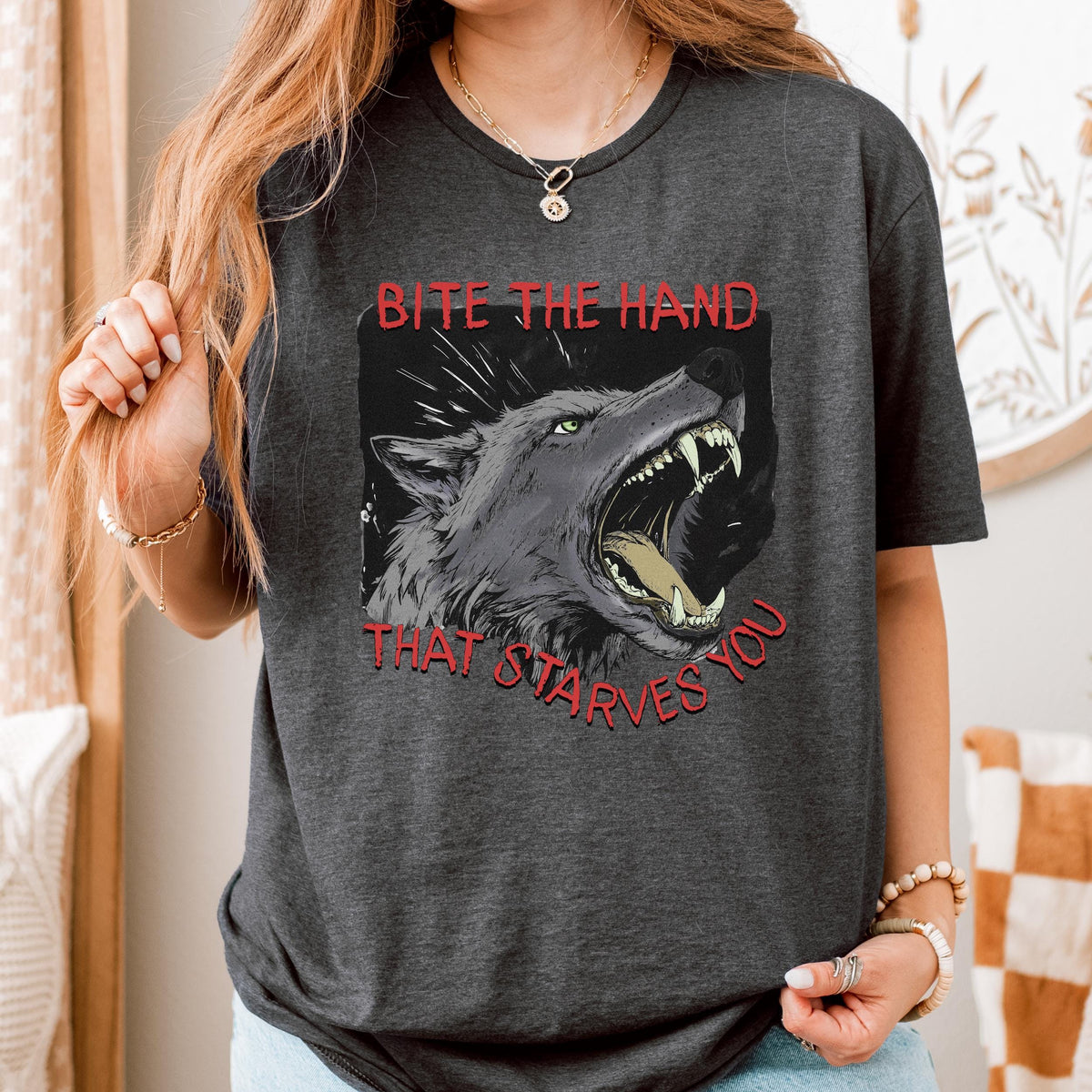Bite the Hand That Starves You graphic shirt featuring Pro-Union Wolf