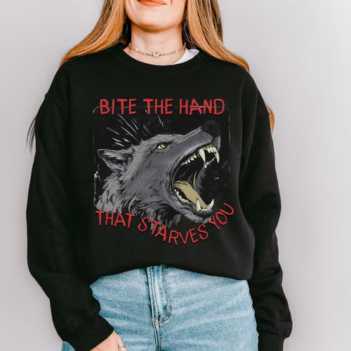 Bite the Hand That Starves You graphic sweatshirt featuring Pro-Worker Wolf in Ash