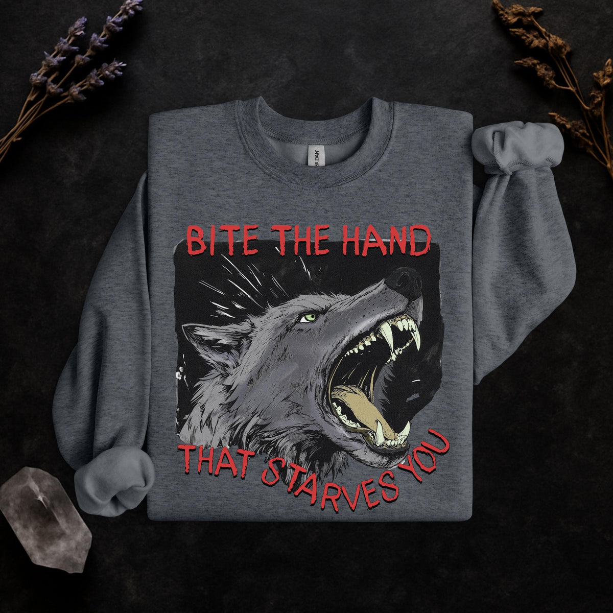Bite the Hand That Starves You graphic sweatshirt featuring Pro-Worker Wolf
