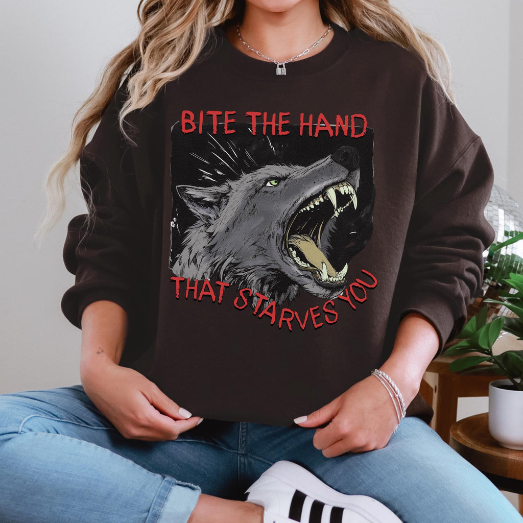 Bite the Hand That Starves You graphic sweatshirt featuring Pro-Worker Wolf