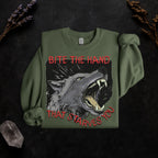 Bite the Hand That Starves You graphic sweatshirt featuring Pro-Worker Wolf