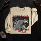 Bite the Hand That Starves You graphic sweatshirt featuring Pro-Worker Wolf