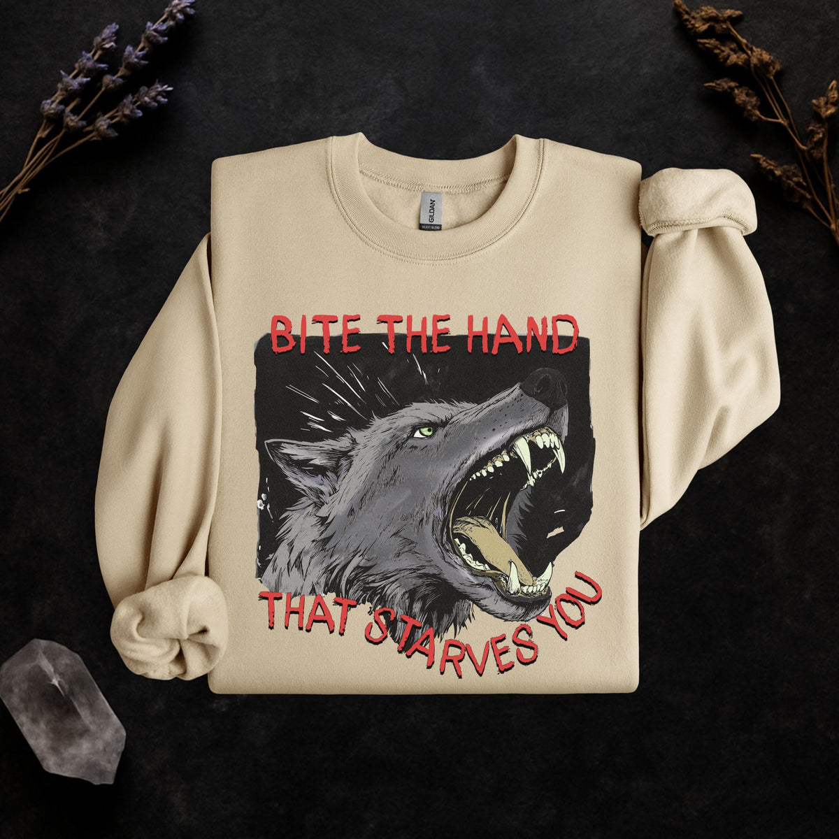 Bite the Hand That Starves You graphic sweatshirt featuring Pro-Worker Wolf