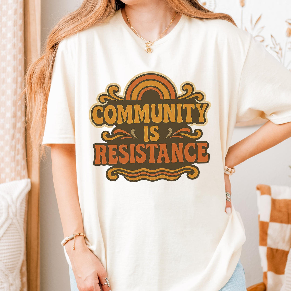 Community Is Resistance graphic shirt featuring Retro Solidarity