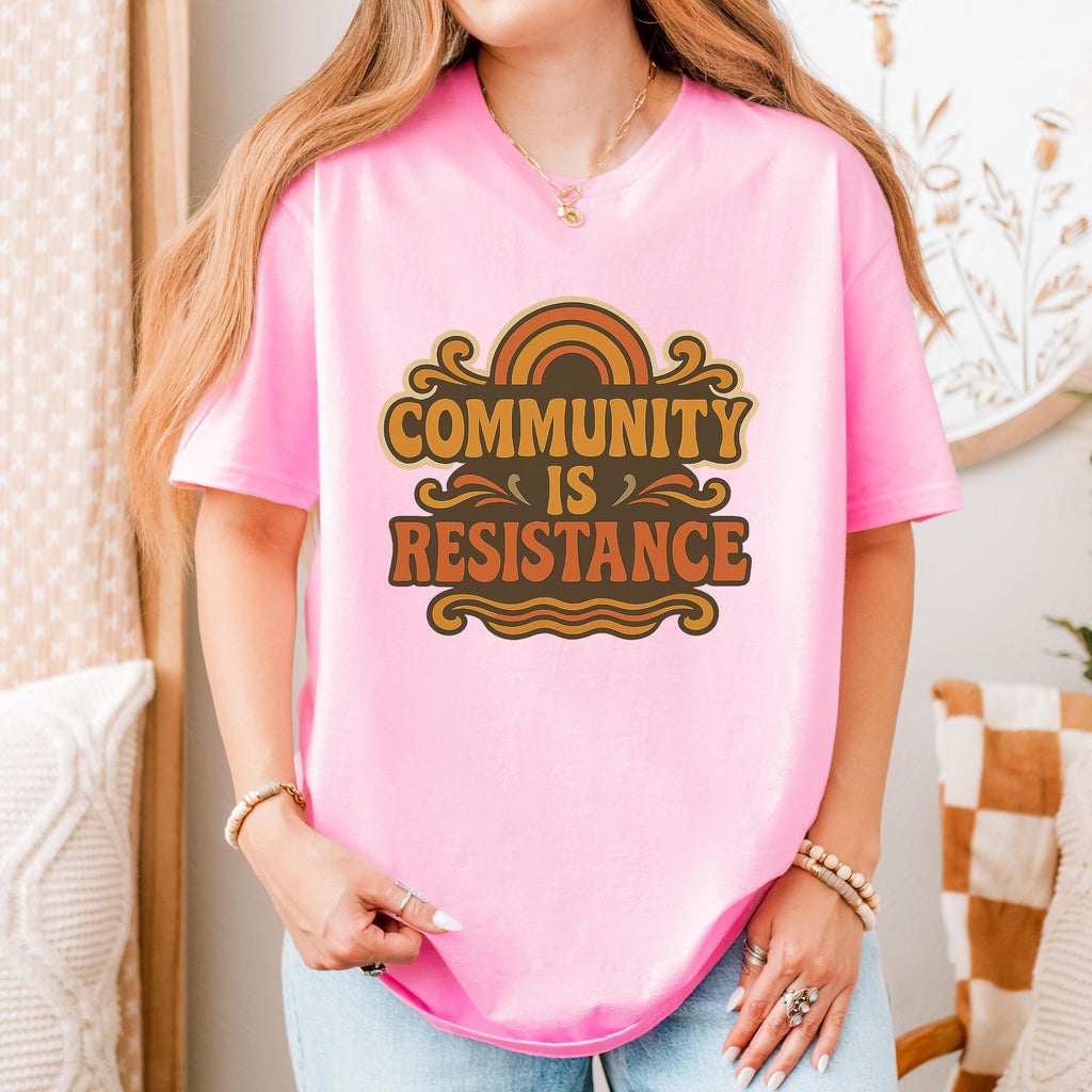 Community Is Resistance graphic shirt featuring Retro Solidarity