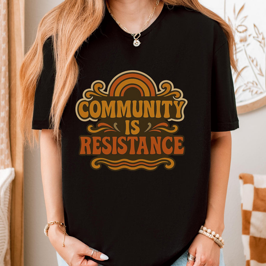 Community Is Resistance graphic shirt featuring Retro Solidarity
