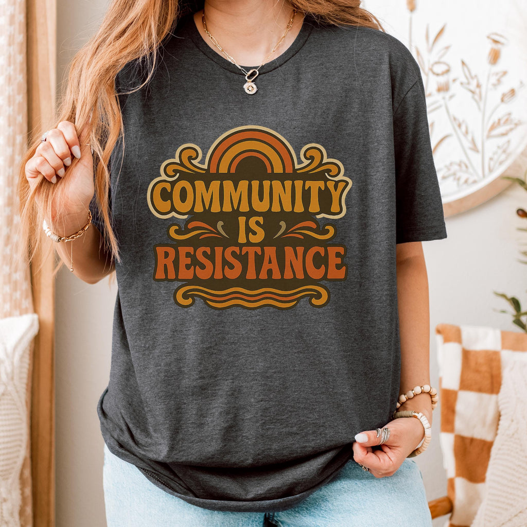 Community Is Resistance graphic shirt featuring Retro Solidarity