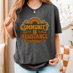 Community Is Resistance graphic shirt featuring Retro Solidarity