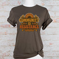 Community Is Resistance graphic shirt featuring Retro Solidarity