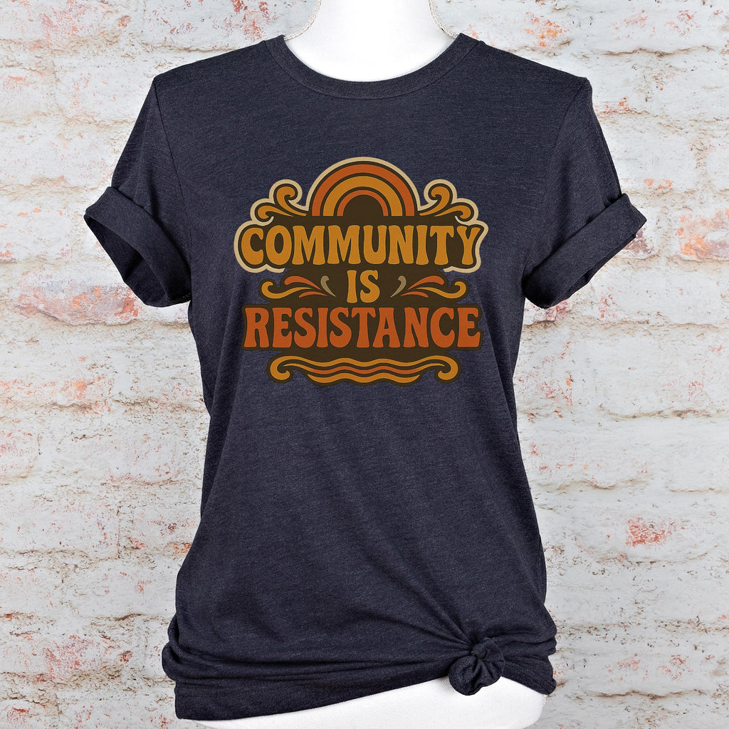 Community Is Resistance graphic shirt featuring Retro Solidarity