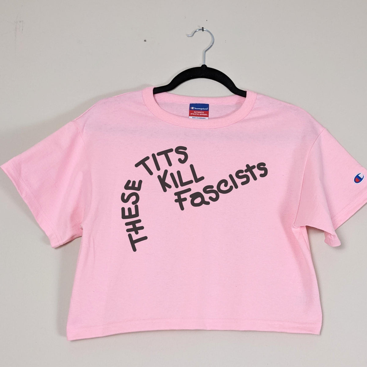 These Tits Kill Fascists graphic shirt featuring Feminist Anti-Fascist