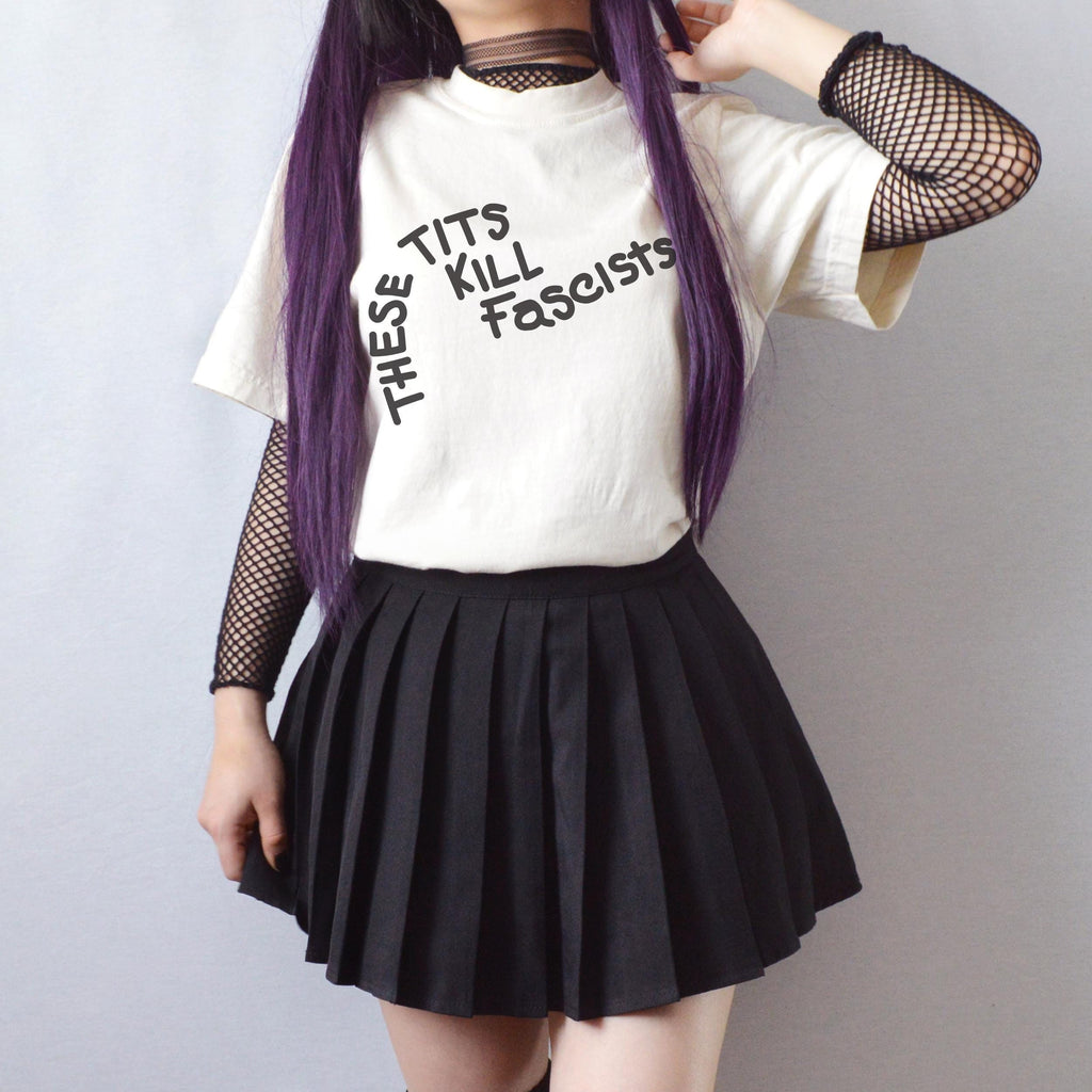 These Tits Kill Fascists graphic shirt featuring Feminist Anti-Fascist