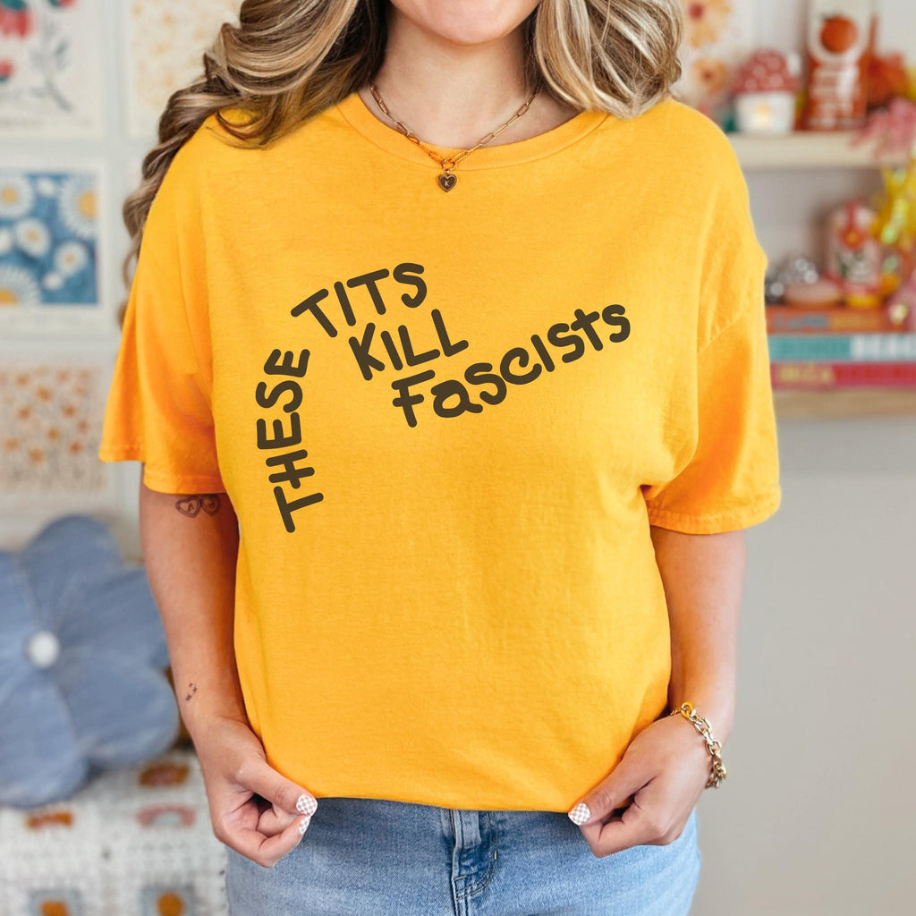 These Tits Kill Fascists graphic shirt featuring Feminist Anti-Fascist