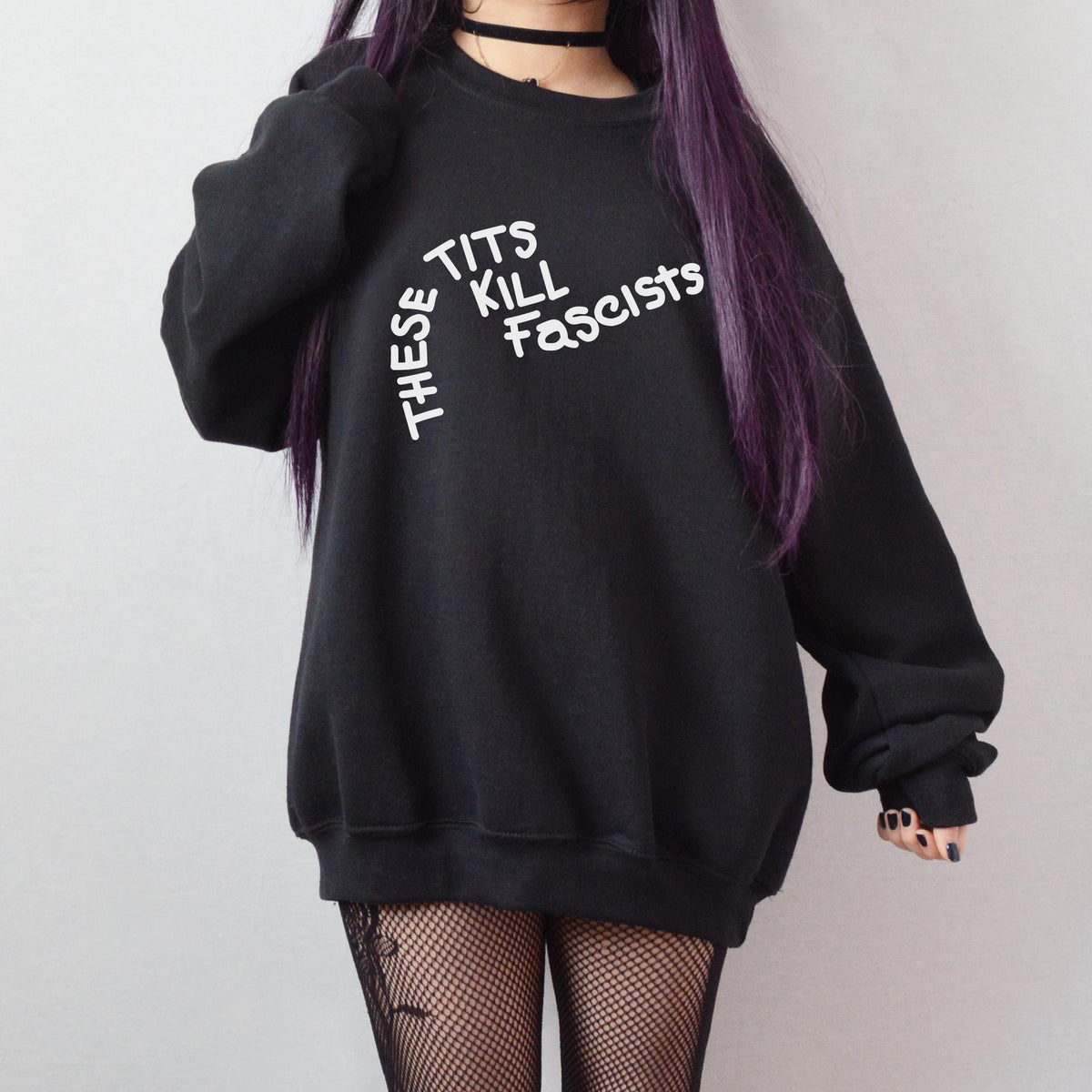 These Tits Kill Fascists graphic sweatshirt featuring Feminist Anti-Fascist in Dark Chocolate