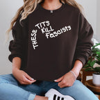 These Tits Kill Fascists graphic sweatshirt featuring Feminist Anti-Fascist