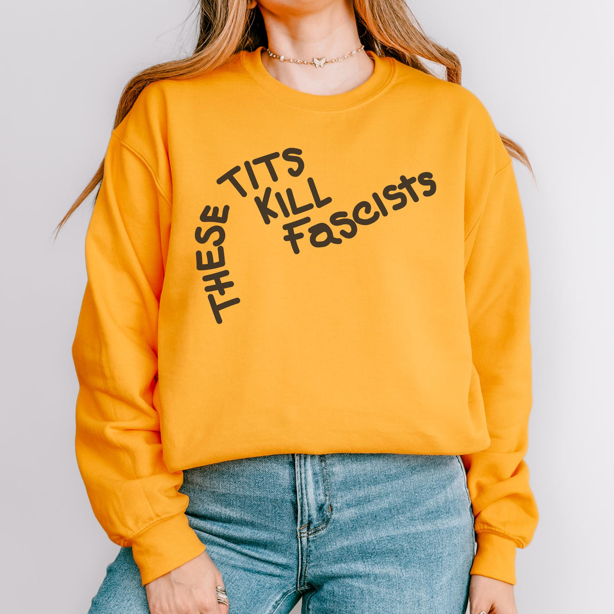 These Tits Kill Fascists graphic sweatshirt featuring Feminist Anti-Fascist