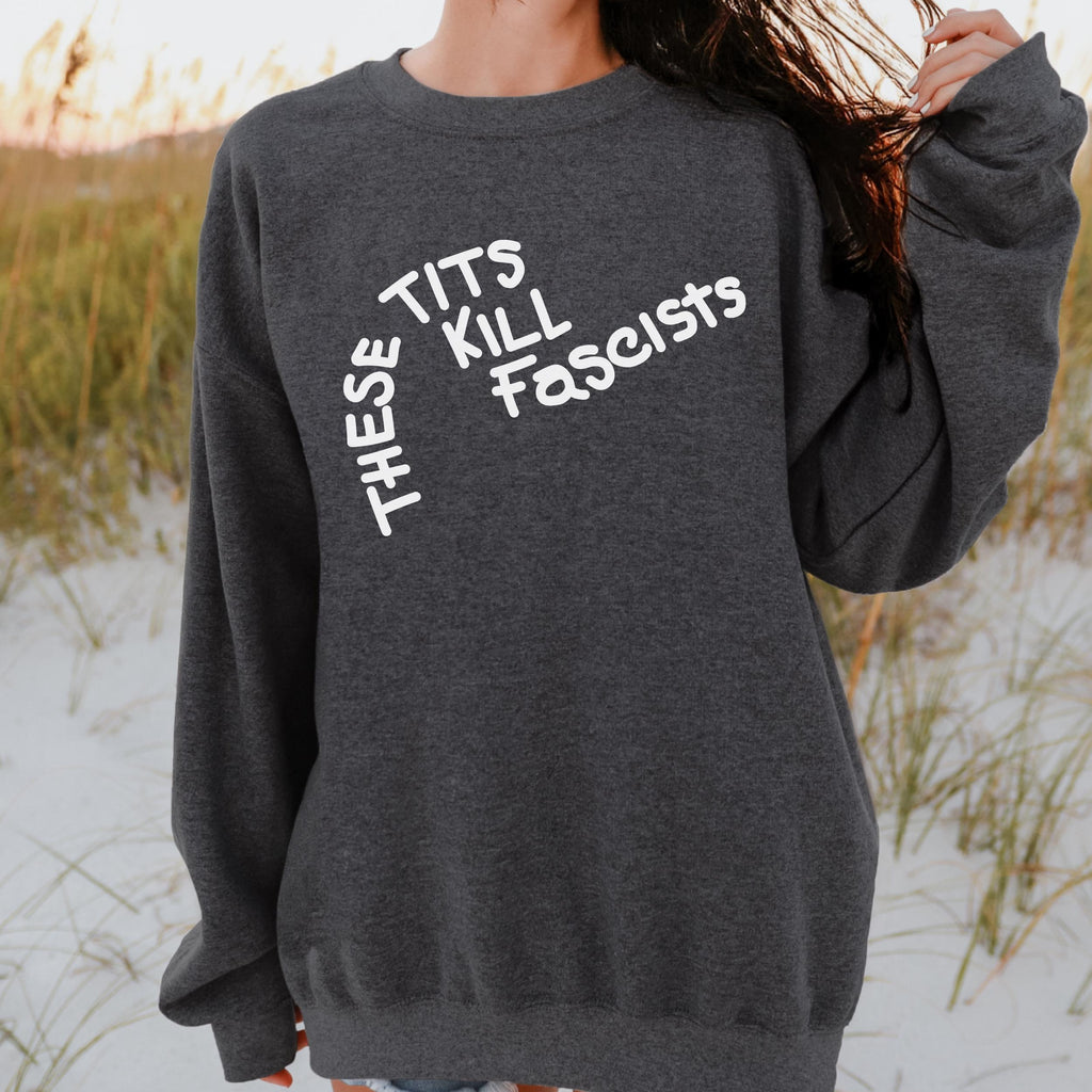 These Tits Kill Fascists graphic sweatshirt featuring Feminist Anti-Fascist
