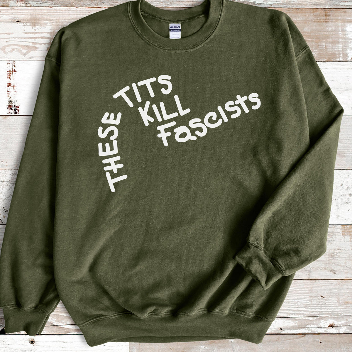 These Tits Kill Fascists graphic sweatshirt featuring Feminist Anti-Fascist