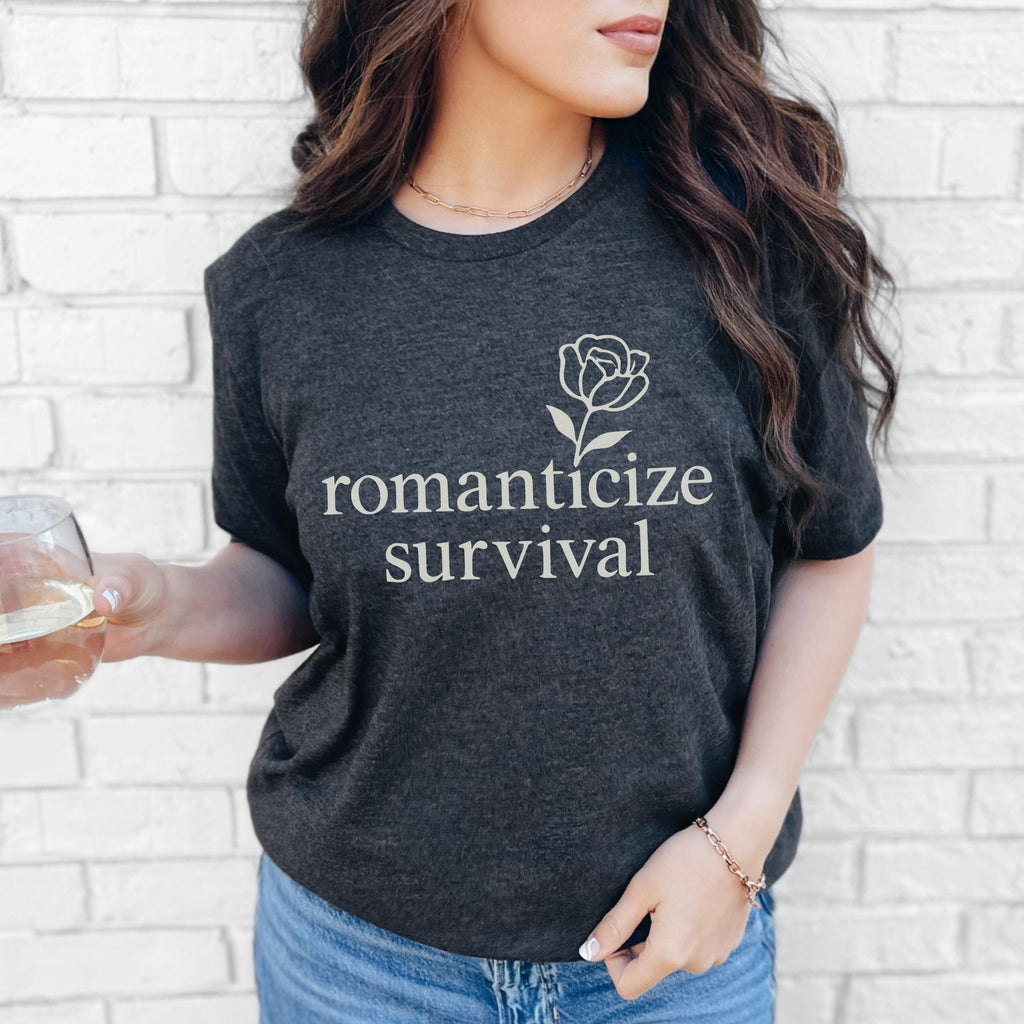 Product photo of Romanticize Survival — Minimalist Floral Dark Humor Design T-shirt
