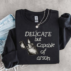 Additional photo of Delicate But Capable of Arson sweatshirt