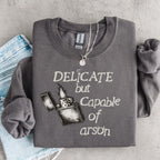 Additional photo of Delicate But Capable of Arson sweatshirt