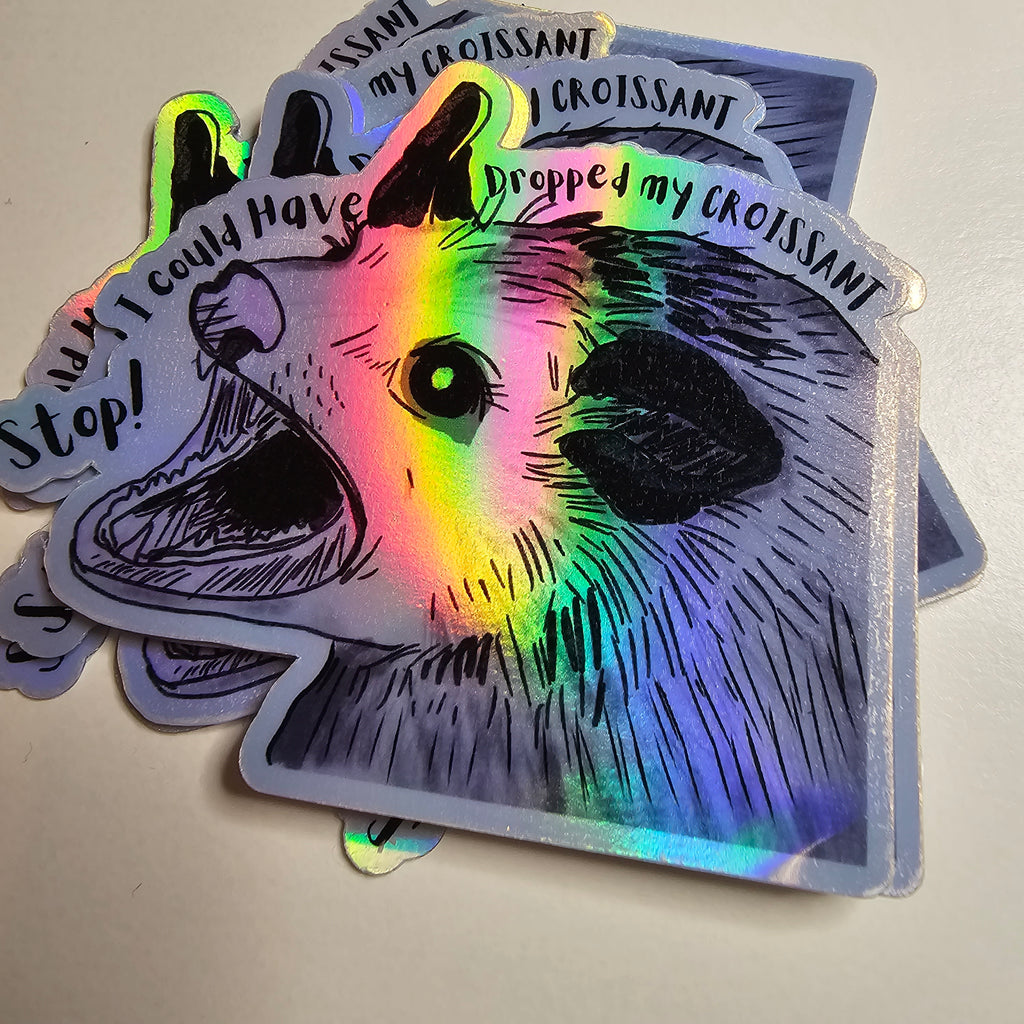 Holographic Opossum Sticker: "Stop I could have dropped my croissant!"