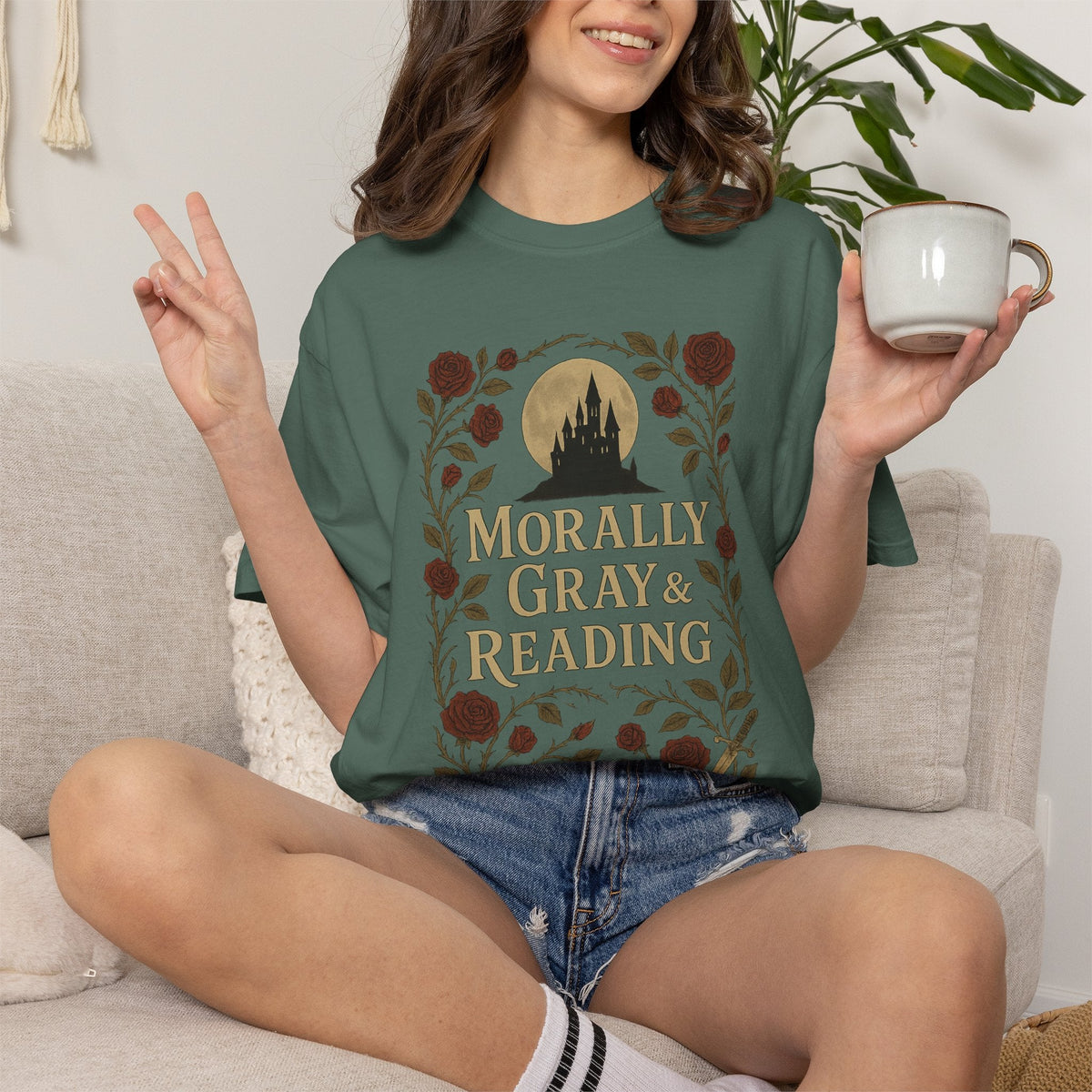 The Faithful Familiar forest green cotton t-shirt featuring a gothic castle, moon, and floral graphic print.