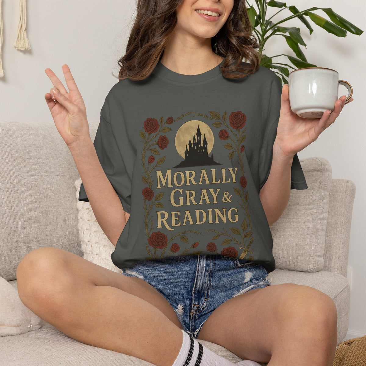 The Faithful Familiar Morally Gray & Reading graphic tee in charcoal cotton with a gothic castle and floral design.