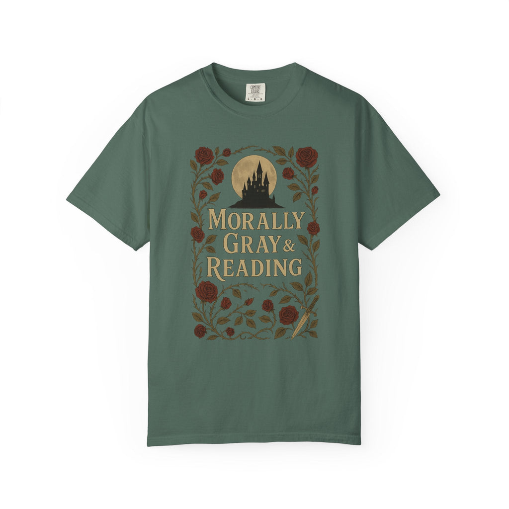The Faithful Familiar garment-dyed green cotton t-shirt featuring a gothic castle, floral, and bookish graphic print.