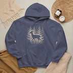 The Faithful Familiar navy blue pullover hoodie featuring a white deer silhouette graphic in a snowy forest setting.