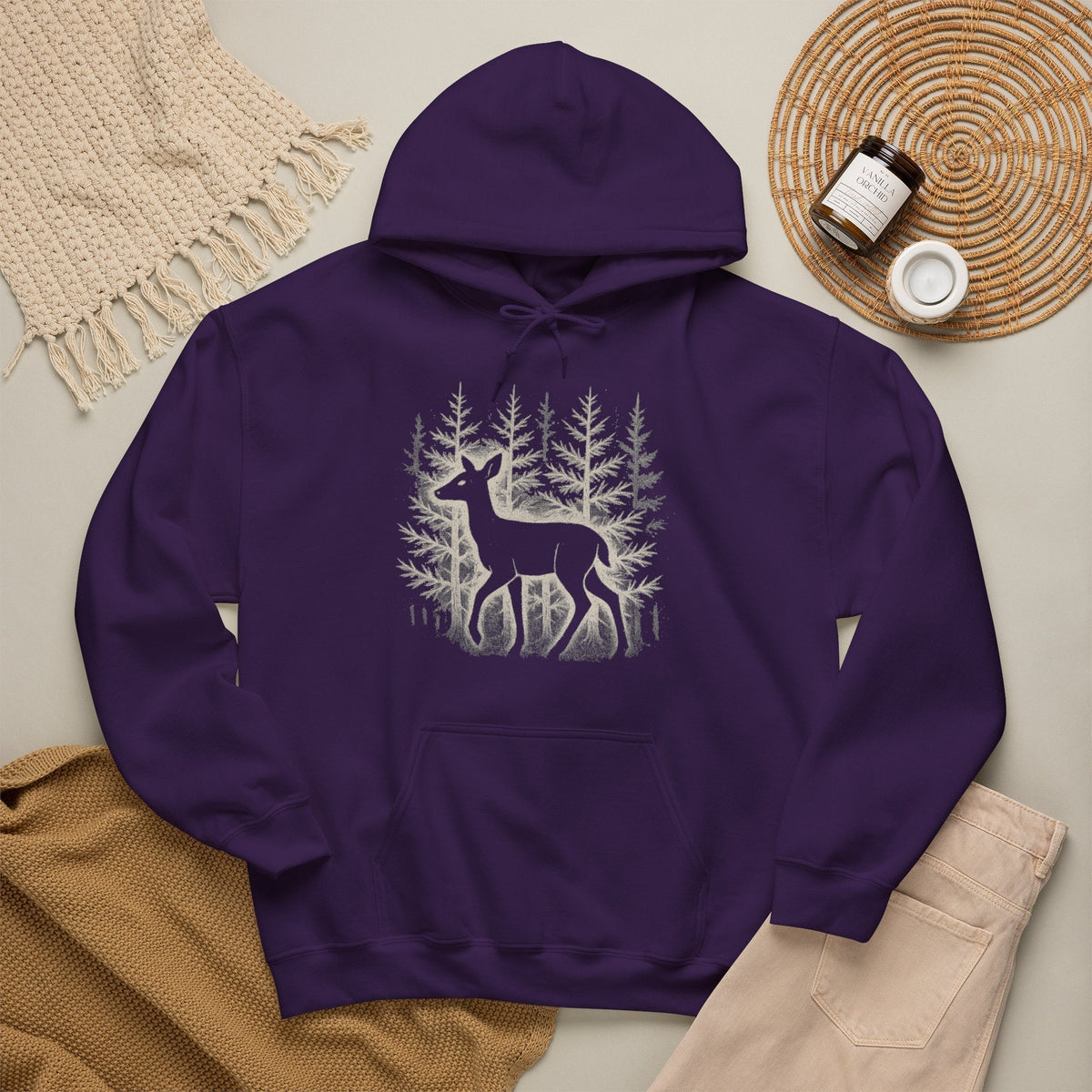 The Faithful Familiar deep purple pullover hoodie featuring a white deer silhouette graphic in a snowy forest scene.